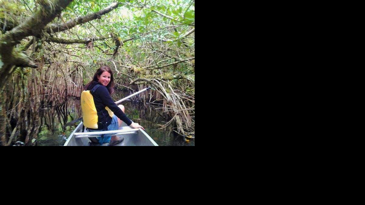 
Kristin Cox, 29, of Miami Beach, enters the mangrove tunnel in Turner River in Big Cypress National Preserve. She, along with a dozen others, took part in the preserve's free ranger-led tours. Everglades National Park also hosts a diverse selection of free guided tours as does Biscayne National Park.
