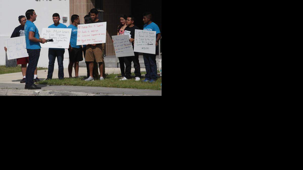 
Joel Aguilera, left front, talks to members of multiple organizations to honor the memory of Martin Luther King Jr., on Thursday. The group gathered to challenge Homestead Mayor Jeff Porter to stand with immigrant communities and come out publicly against the Department of Homeland Security’s Priorities Enforcement Program, which they say will help law enforcement agencies identify and facilitate the removal of criminal illegal immigrants in the custody of state and local officials.
