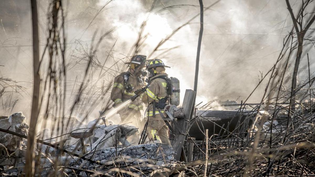 A small brush fire consumed five acres — including an unoccupied house — in Southwest Miami-Dade early Wednesday morning, according to Miami-Dade Fire officials.