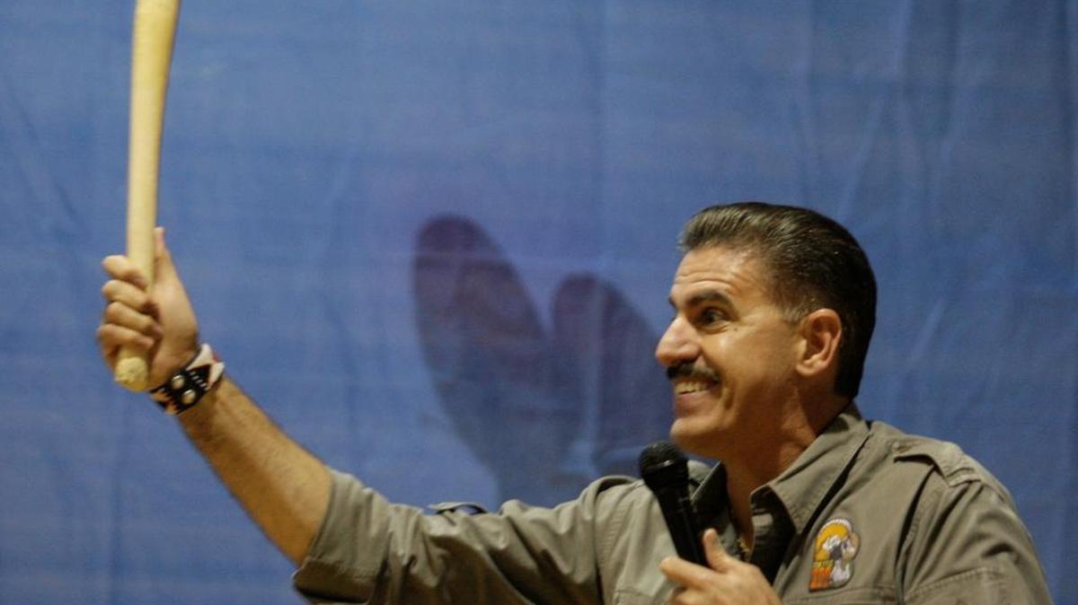 Zoo Miami ambassador Ron Magill holds up a large walrus penis bone during his “Sex & the Animals” presentation several years ago. After a three-year hiatus, Magill will give his well-known presentation on Feb. 3, 2018.