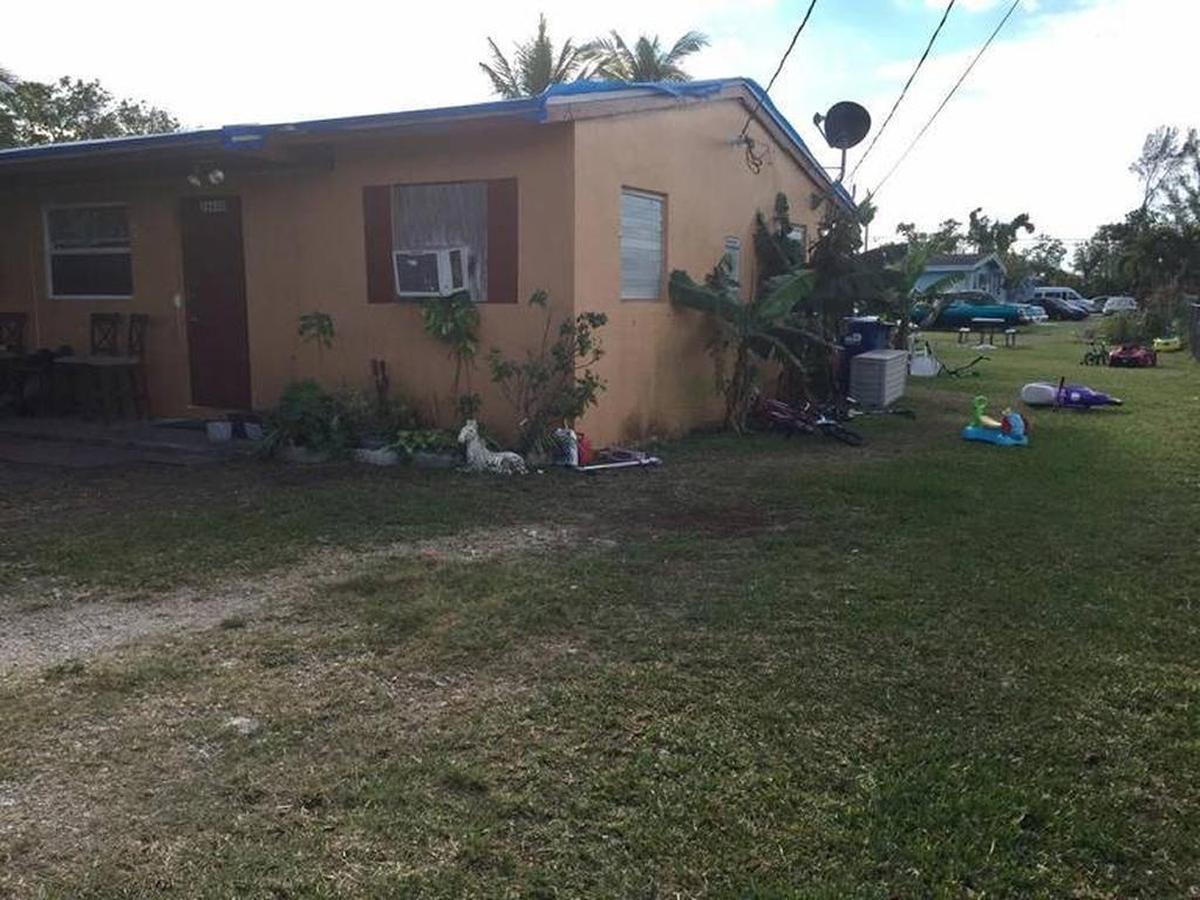 The Homestead house where Christina Hurt lived with her six children, the youngest of whom she is accused of killing by waiting to seek medical attention after the 1-year-old was badly burned.