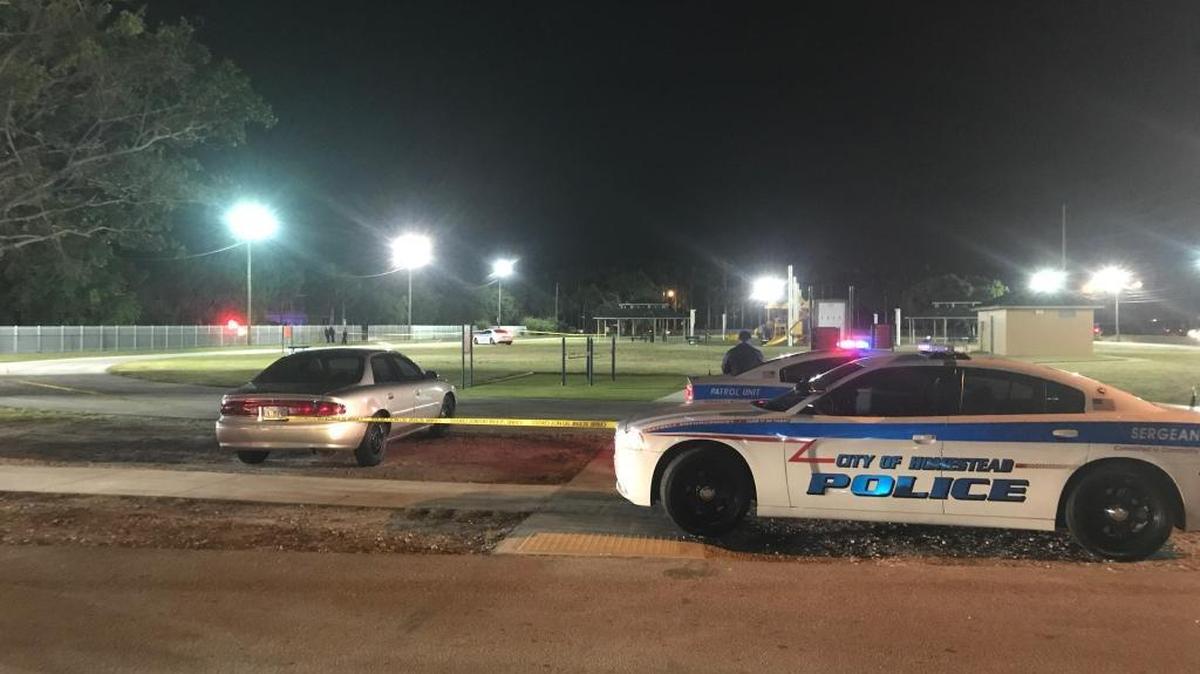 Police investigate the scene of a fatal shooting near Blakey Park in Homestead.