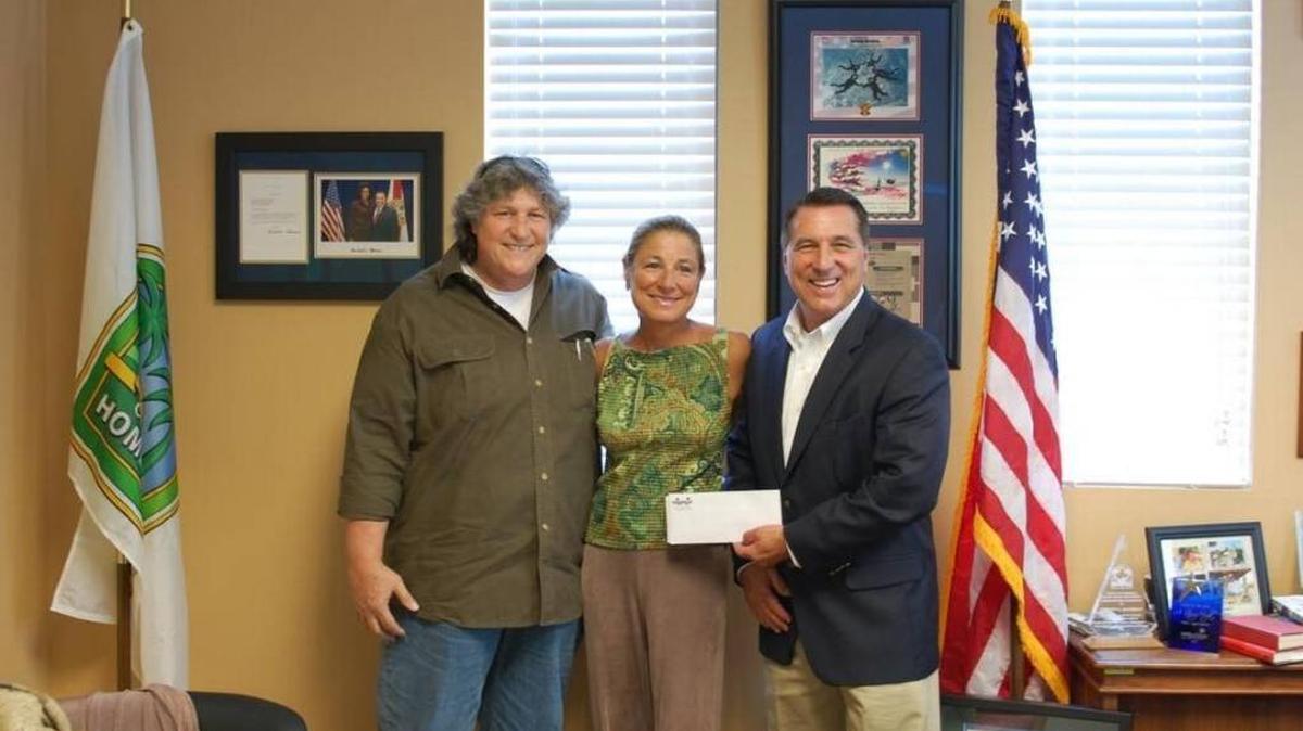 From left to right: Richard DiBenedetto, head of Florida Rock Stars; Cheryl A. Lawko, vice president of resource development for the Special Olympics in Miami-Dade County; and Steven Bateman. Lawko told the Herald the Special Olympics were supposed to partner with the Autism Resource Center, but it never happened.