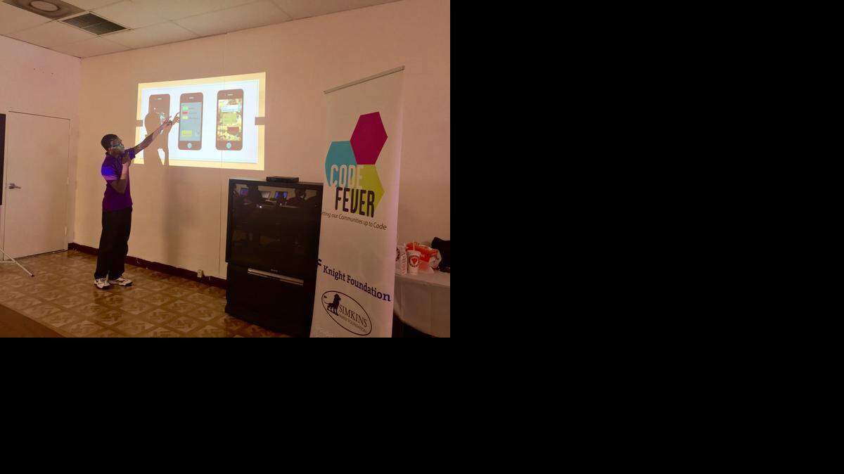 
Marquis Strickland, 15, presented his business application idea, Pin Stop, during the last day of a Code Fever Miami workshop at the Richmond Heights Resource Center. He won $100 second-place prize for his work over the last eight weeks.
