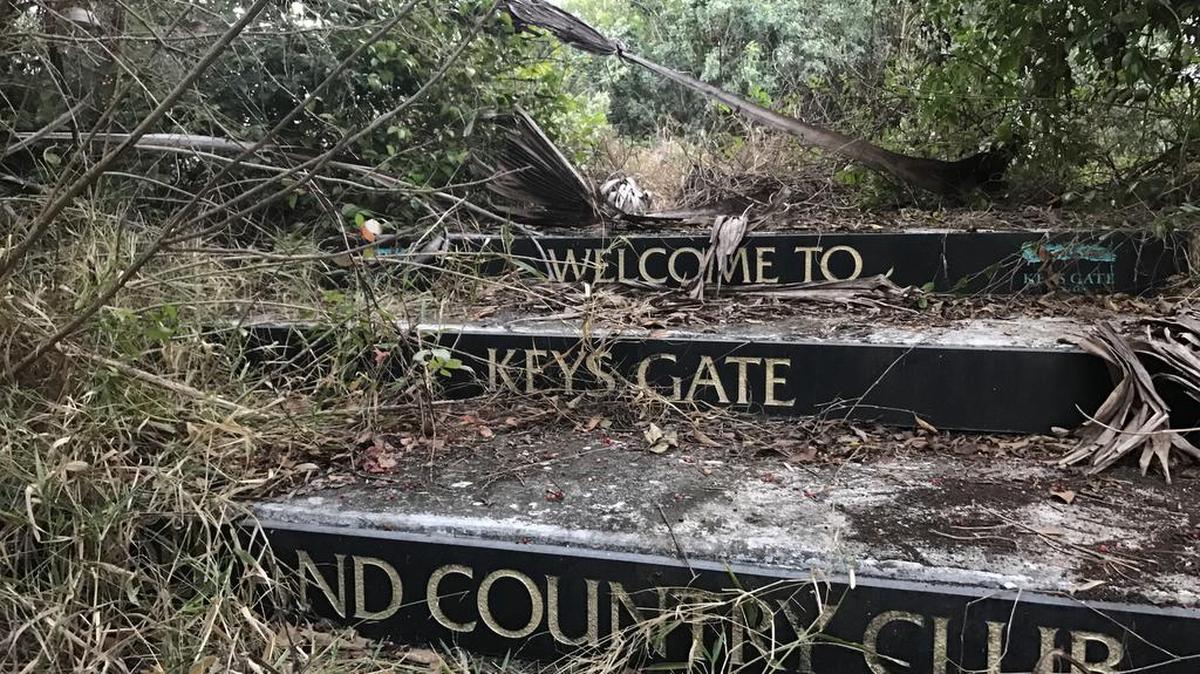 Piles of branches and trash have overtaken tee boxes at the Keys Gate Golf Course in Homestead.