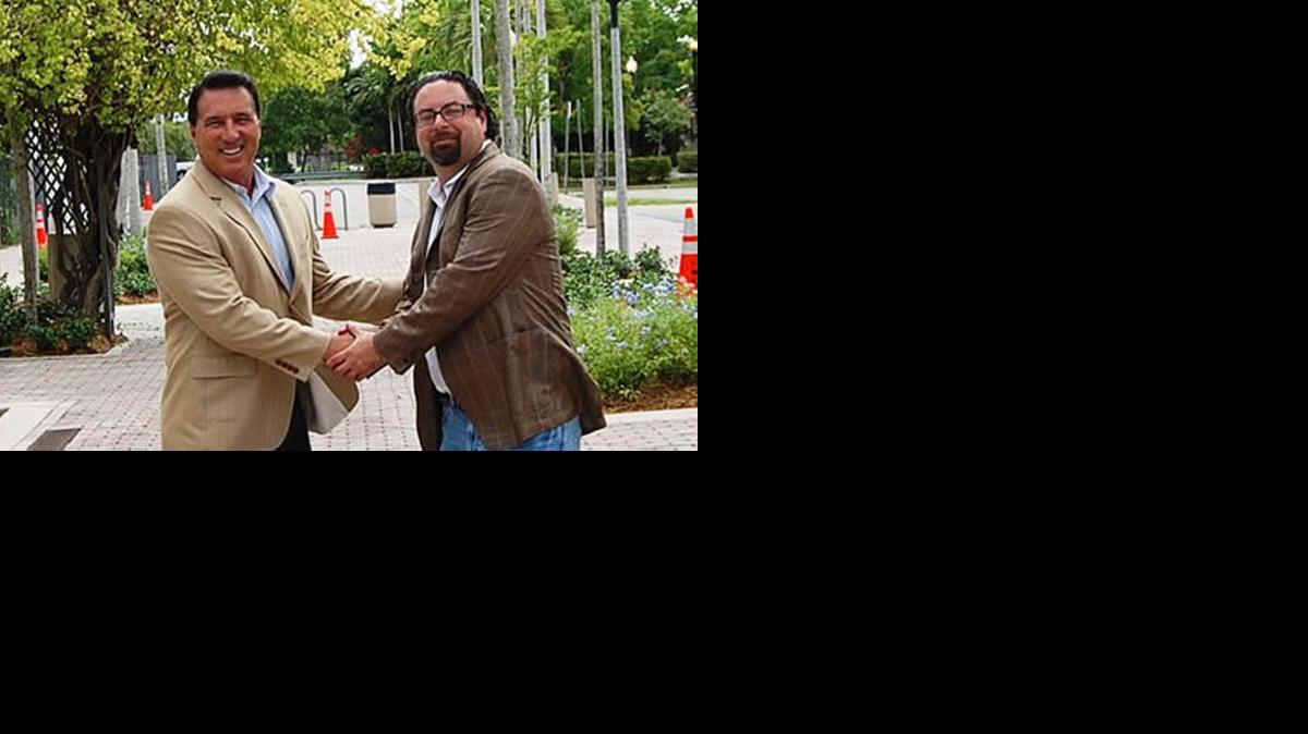 
Steve Bateman, left, and Ernesto Perez worked together when Bateman was mayor and Perez was expanding his chain of colleges.
