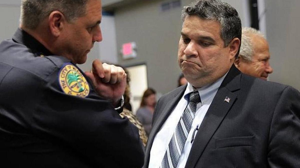 
Police Chief Rodolfo Llanes (left) and City Manager Daniel Alfonso 
