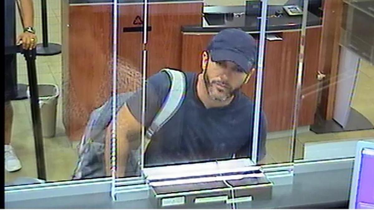 
The FBI released photos of a man investigators say entered a Bank of America branch at 20099 SW 127 Ave. just before 4 p.m. Thursday and demanded money.
