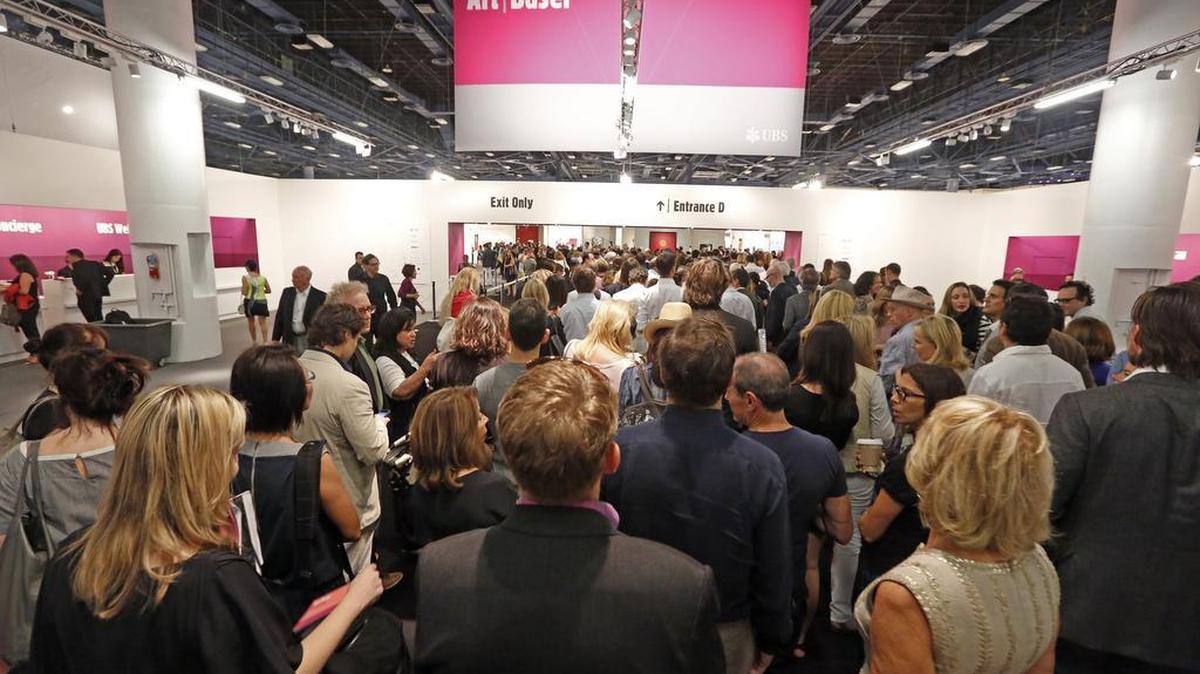 The opening-day crush at Art Basel on Miami Beach at the Miami Beach Convention Center on Dec. 3, 2014.