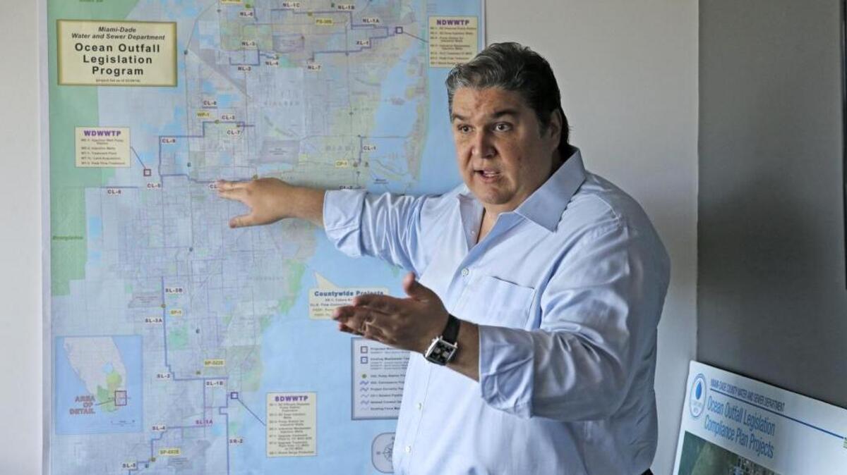 Ralph Garcia-Toledo, president of G-T Construction Group Inc., explains some of the details of Miami-Dade’s Ocean Outfall sewer project in the Coral Gables offices of CH2M Hill on Friday, July 8, 2016.