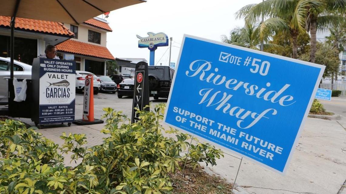 One of the signs along NW S.River Drive photographed on Thursday, March 3, 2016, supporting the proposed development of an area along the northern shore of the Miami River. The Garcia family would operate a raw bar in the project, planned on the site where they currently run a commercial fishing operation.
