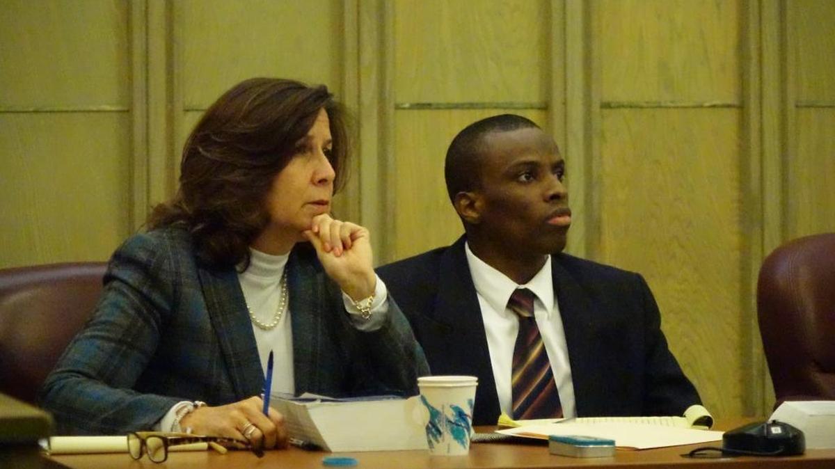 Kendrick Silver, who is accused of murdering a restaurant security guard, in trial on Wednesday with defense lawyer Ann Marie Bloch. Silver is facing the death penalty.
