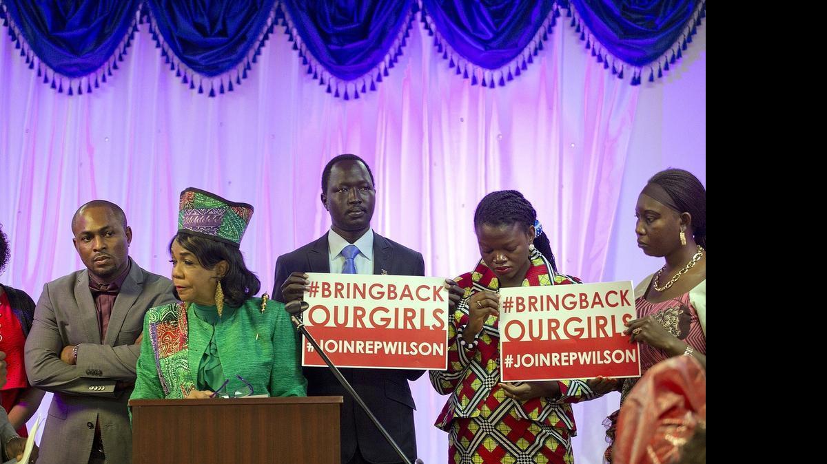 
Congresswoman Frederica S. Wilson (at podium) chats with congregants of The Word of Life Bible Church on Sunday, July 26, 2015 about the #BringBackOurGirls movement and to update South Florida’s Nigerian community about the on-going efforts to rescue the kidnapped Nigerian school girls abducted by the terrorist group Boko Haram, more than a year ago. Alongside Congresswoman Wilson are Pastor Ige Osaigbovo (at left) and (at right) Mandela fellows, David Kuany of South Sudan, Alueshima Utsaha of Nigeria and Judith Mogode of Chad.
