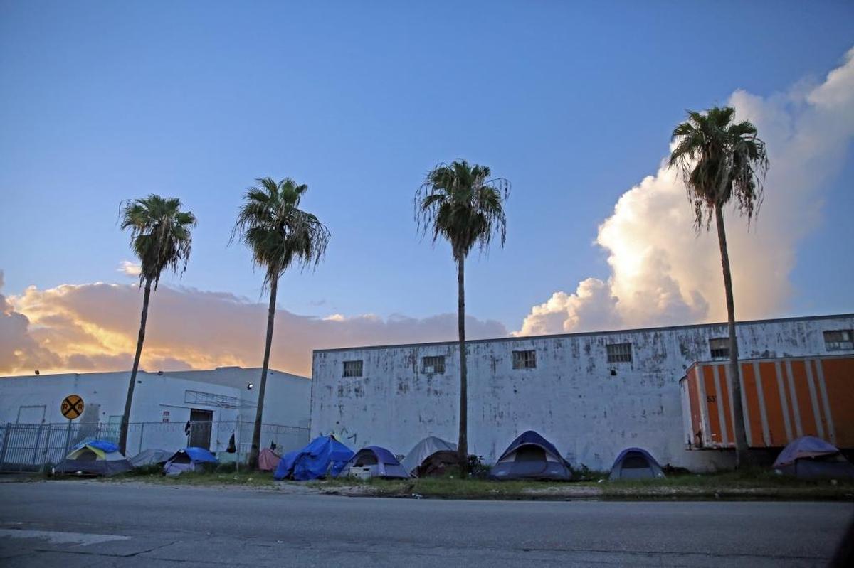 Miami-Dade is taking action against a persistent homeless encampment of sexual offenders near Hialeah. Homeless Trust workers alongside city employees and police officers, canvased the tents Monday night, August 21, 2017, to talk to their occupants about finding them places to live that don’t conflict with county rules on how close offenders can be to schools and parks.