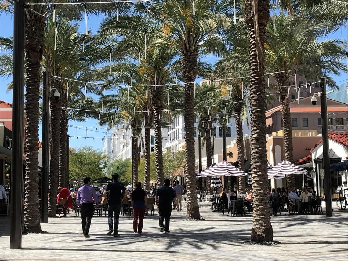 The recently remade restaurant row in Coral Gables, Giralda Plaza, was designed as a shared street but is functioning as a car-free pedestrian plaza in a two-year experiment.