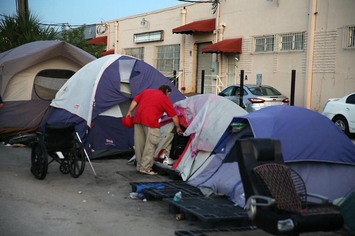 Miami-Dade is taking action against a persistent homeless encampment of sexual offenders near Hialeah. Homeless Trust workers alongside city employees and police officers, canvased the tents Monday night, August 21, 2017, to talk to their occupants about finding them places to live that don’t conflict with county rules on how close offenders can be to schools and parks.
