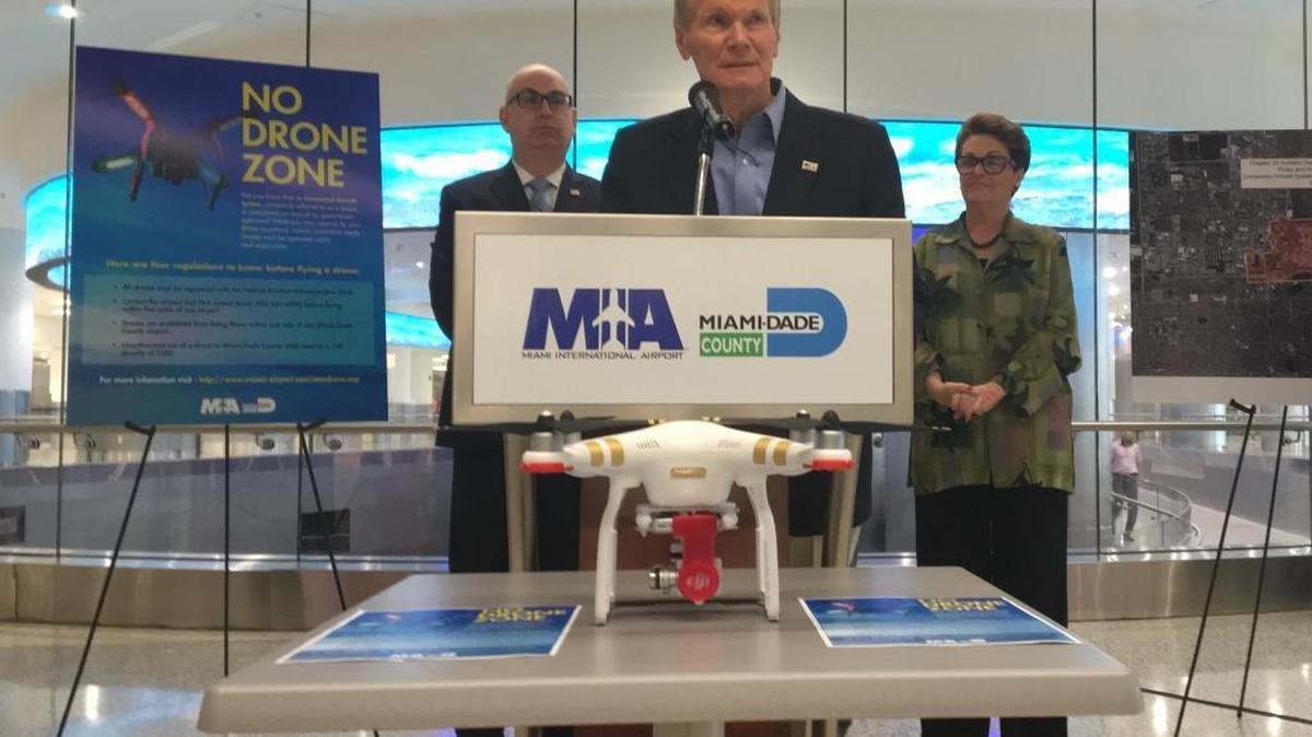 Sen. Bill Nelson, a Democrat from Florida, addresses a press conference Friday at Miami International Airport on the dangers of drones near flight paths. A drone rests in front of the lectern. He’s flanked by MIA director Emilio González and Miami-Dade Commissioner Rebeca Sosa.