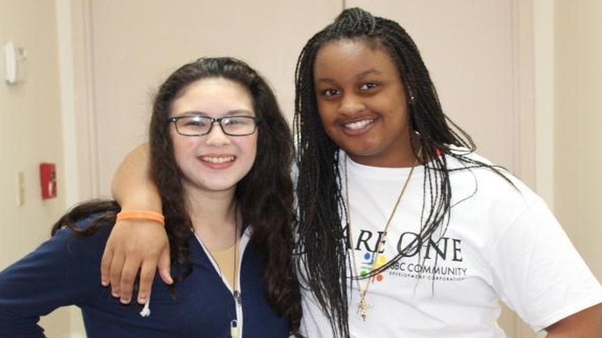 Lamari Morrison, a junior from Westminister Christian School and Alexandra Ferrer, a freshman from Arthur & Polly Mays Conservatory School during Second Baptist Church's ‘Our Youth Can Save the World’ peace rally on Friday, Jan. 22.