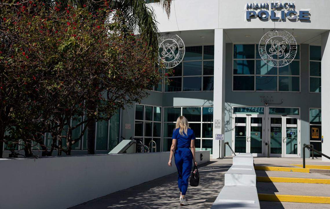Maria S., 38, who alleges she was raped by Oren Alexander during a private party at the Versace Mansion in 2014, walks toward the Miami Beach Police Department on Thursday, Dec. 19, 2024, in Miami Beach, Fla. Maria reported the assault to police on Thursday.