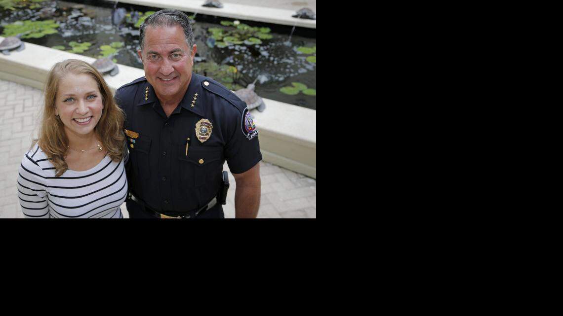 
Danielle Press and her father, Chief of Police in Key Biscayne, Charles Press, at Village Hall in Key Biscayne on Wednesday, November 19, 2014.
