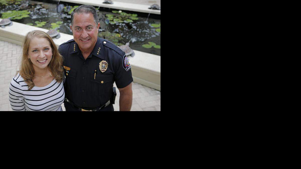 
Danielle Press and her father, Chief of Police in Key Biscayne, Charles Press, at Village Hall in Key Biscayne on Wednesday, November 19, 2014.

