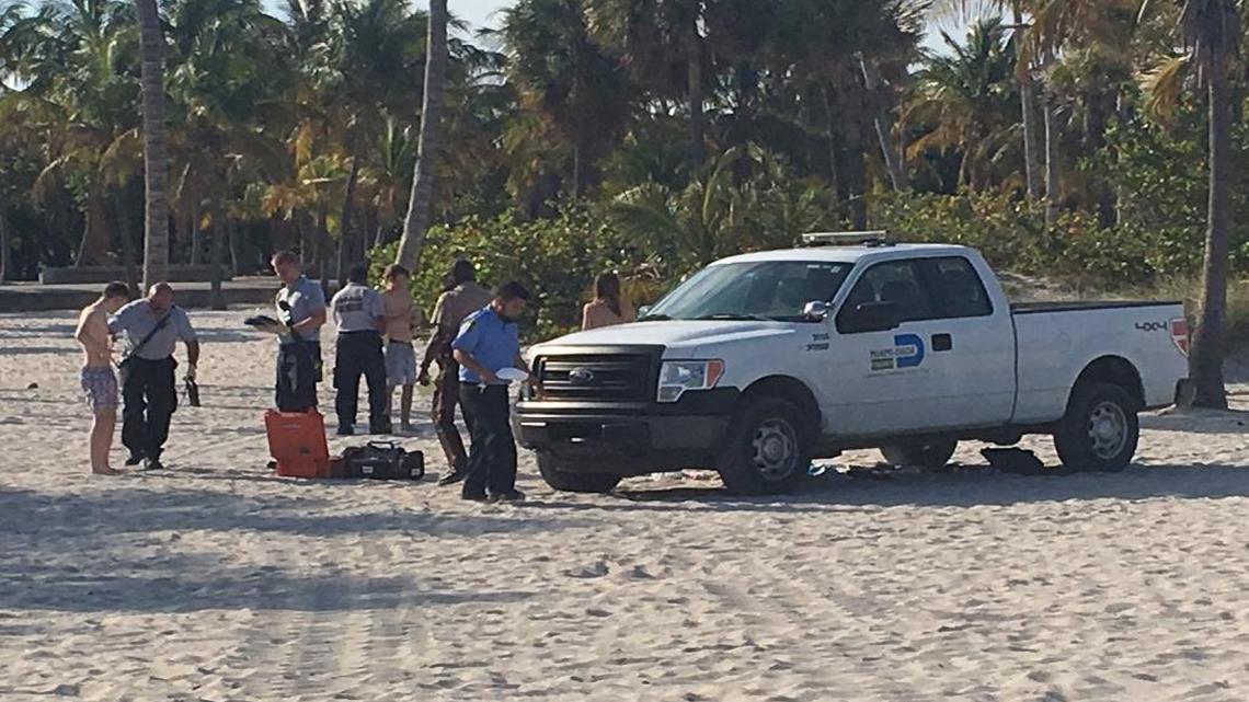A Miami-Dade County Parks and Recreation officer ran over three Crandon Park beachgoers with his county truck as they lay on the sand Friday evening, police said.