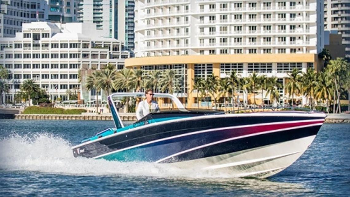 Miami Vice fast boat to appear at Miami International Boat Show with TV series costar Olivia Brown.