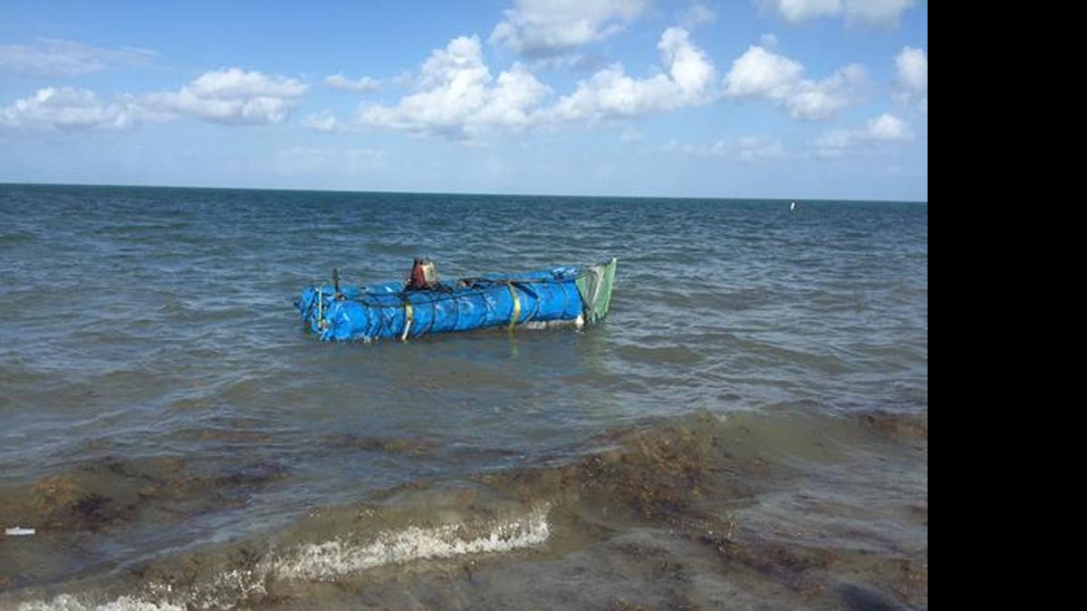
A raft that was carrying 13 Cuban migrants washes ashore on Key Biscayne.
