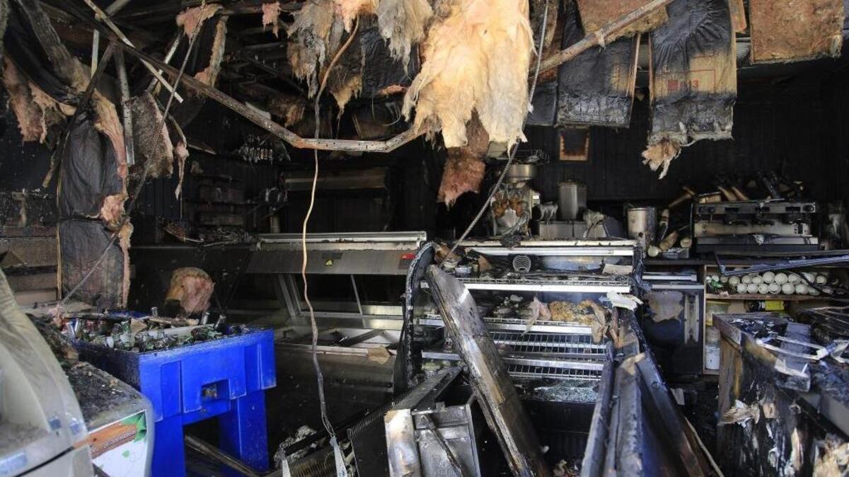 The Oasis cafe, a Key Biscayne landmark, closed Monday after an electrical fire caused extensive damage.