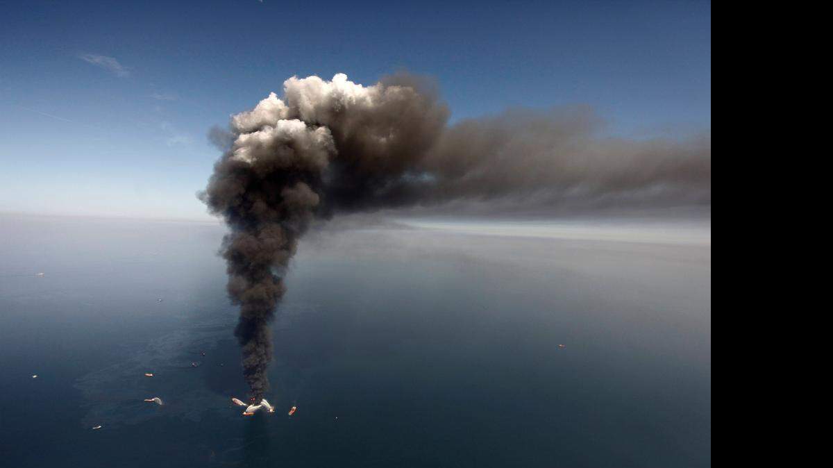 
A day after BP’s Macondo well exploded in April 2010, smoke billowed from the Deepwater Horizon rig. 
