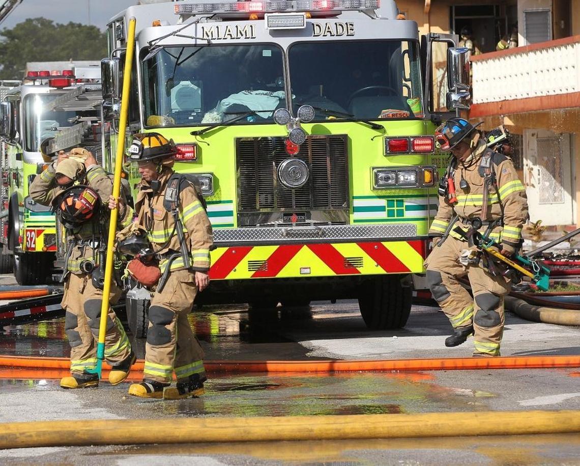 Miami-Dade firefighters work a three-alarm fire in the 18600 block of Northeast Second Avenue on Wednesday, Dec. 20, 2017, where an apartment fire spread throughout the complex. No one was injured.