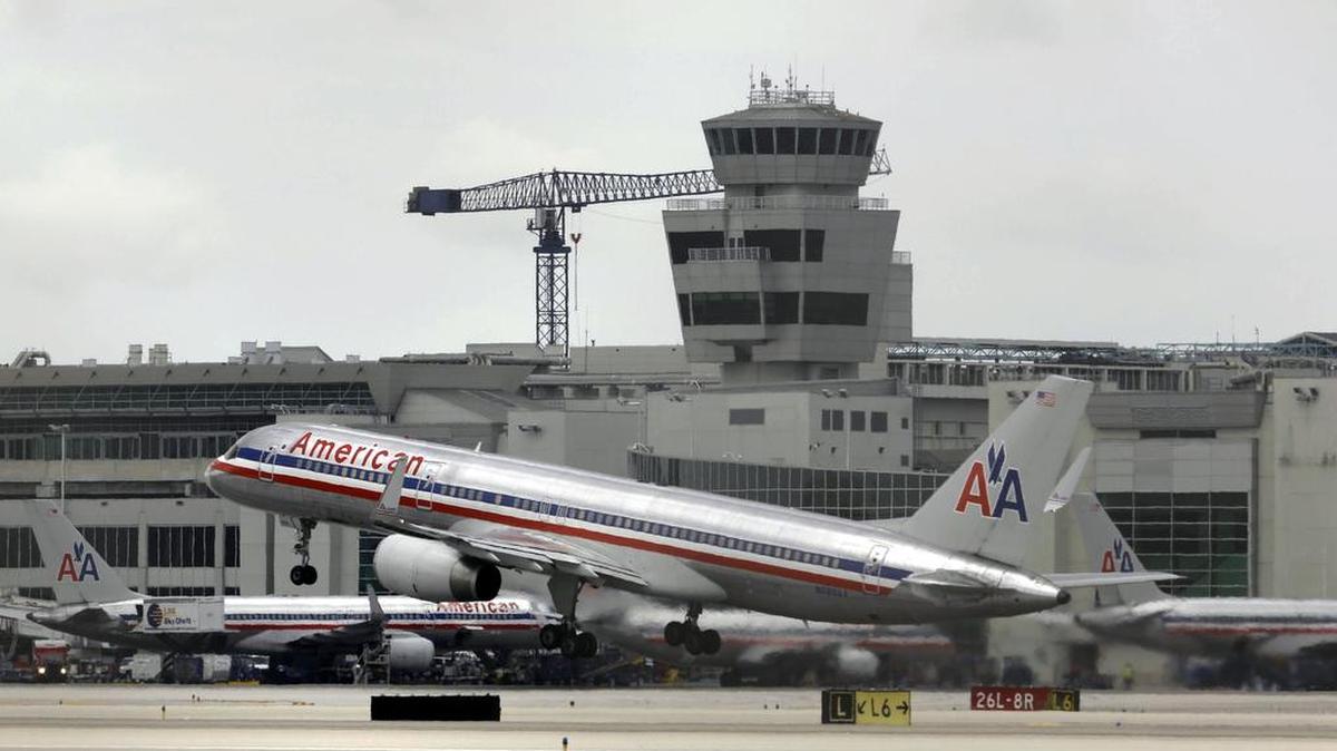 An America Airlines passenger plane takes off at Miami International Airport in Miami, Monday April 22, 2013.