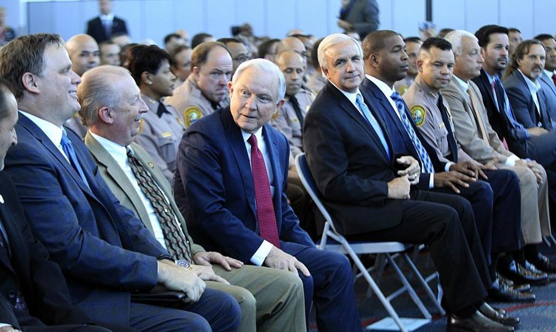 Miami Dade County Mayor Carlos Gimenez, right, joined U.S. Attorney General Jeff Sessions, who talked about the growing trend of violent crime in sanctuary cities highlighting jurisdictions like Miami-Dade that have increased their cooperation and information sharing with federal immigration authorities. Sessions attended a conference at Port of Miami Terminal E, on Wednesday, August 16, 2017.
