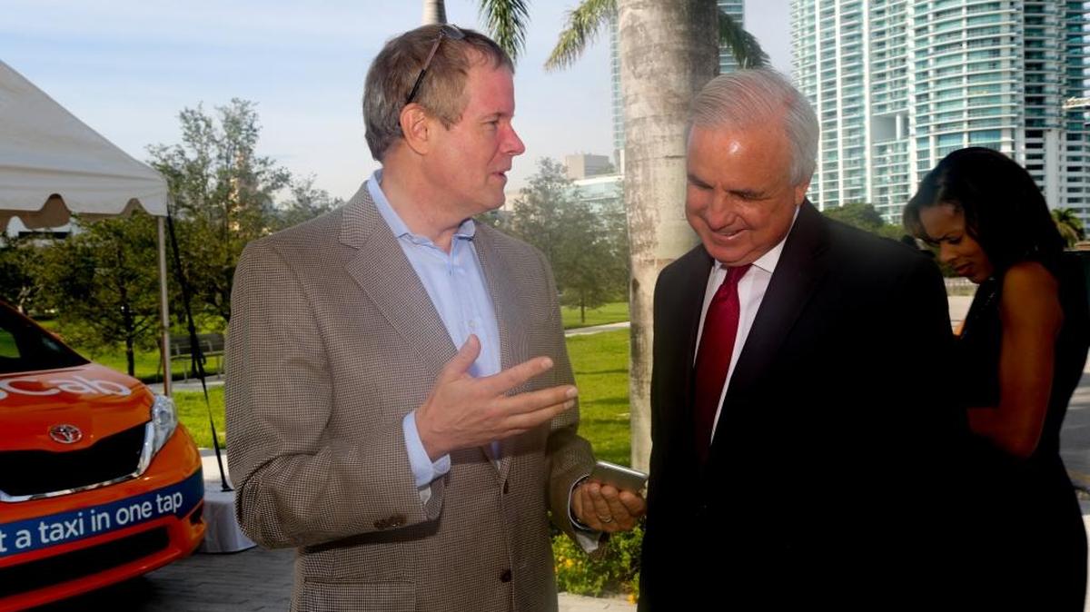 
Martin Heikel, CEO of ZabCab, unveils the taxi app in South Florida with Miami-Dade Mayor Carlos Gimenez
