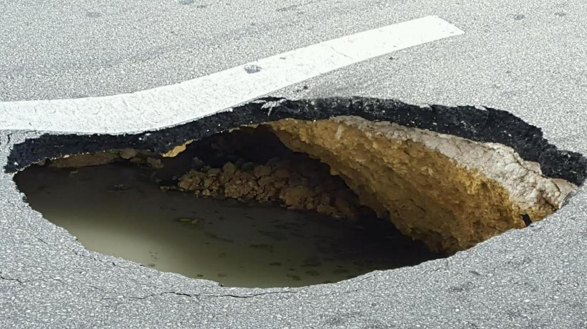 
A sinkhole opened Monday on Southwest 27th Avenue between Sixth and Seventh streets. The southbound lanes were closed as crews evaluated how bad the damage was.
