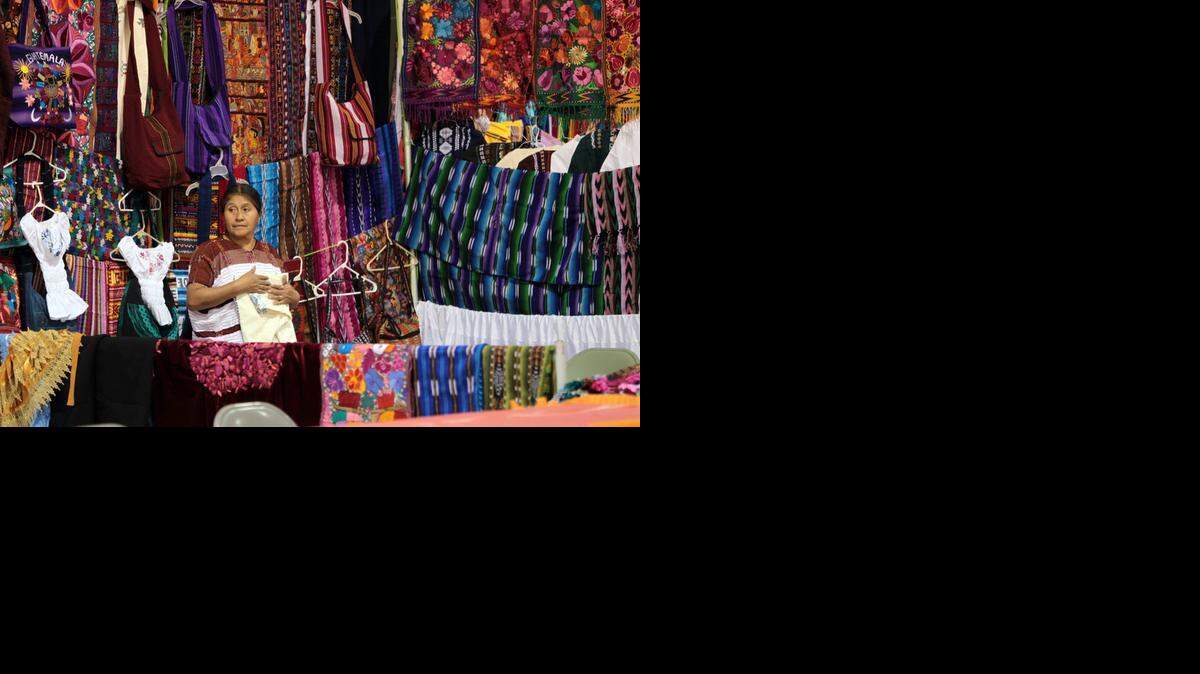 
A Guatemalan artisan shows off some of her work during ExpoNica 2012.
