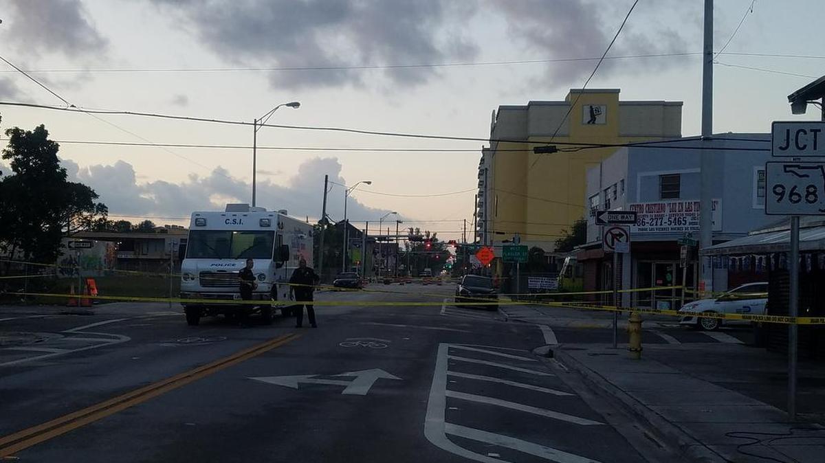 Miami police blocked off a stretch of Northwest First Street, from Seventh to Eighth avenues, as they investigated a dead body found in Little Havana on Tuesday, Dec. 26, 2017.