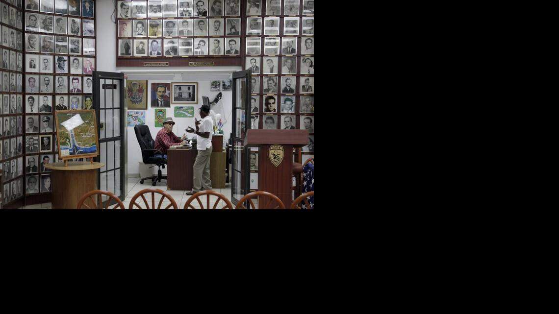 
Bay of Pigs Veterans Association Brigade 2506 members Jorge Infiesta Casals and Santiago Junt at the Bay of Pigs Museum in Little Havana in 2011.
