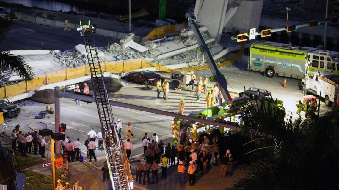 Recovery operations continue Friday evening, March 16, 2018, at the site of the collapse FIU pedestrian bridge.