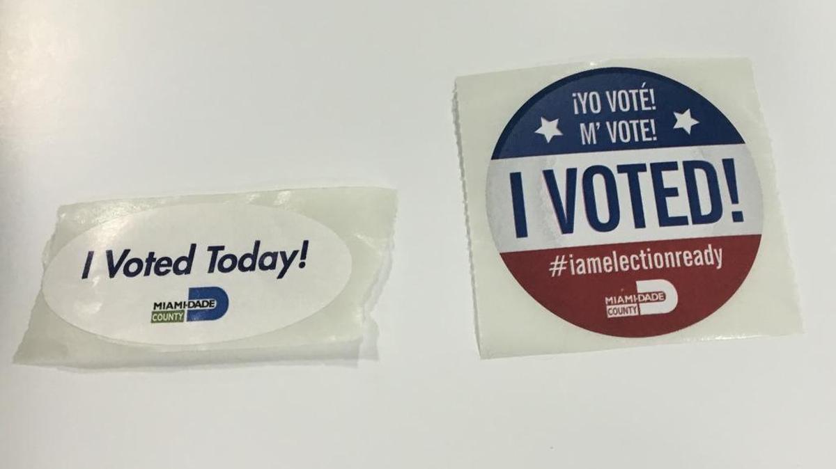 Miami-Dade County’s old “I Voted” sticker, left, and the new one.