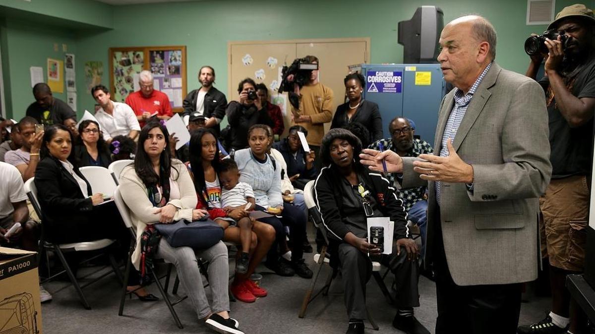 Jorge R. Cibran, a senior administrator in Miami-Dade’s housing department, assures public-housing residents that complexes near a proposed David Beckham stadium are not being considered for demolition.