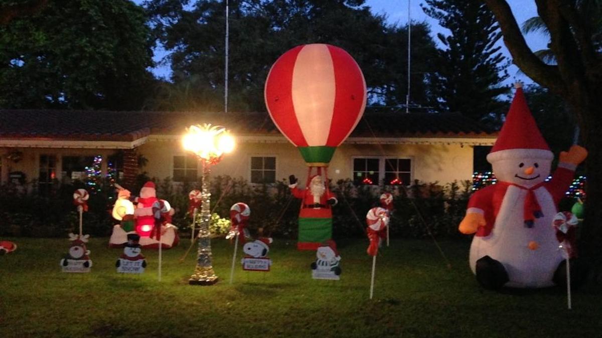 Maryann and Anthony Duva make their display each year as a gift to their neighbors in Biscayne Park.