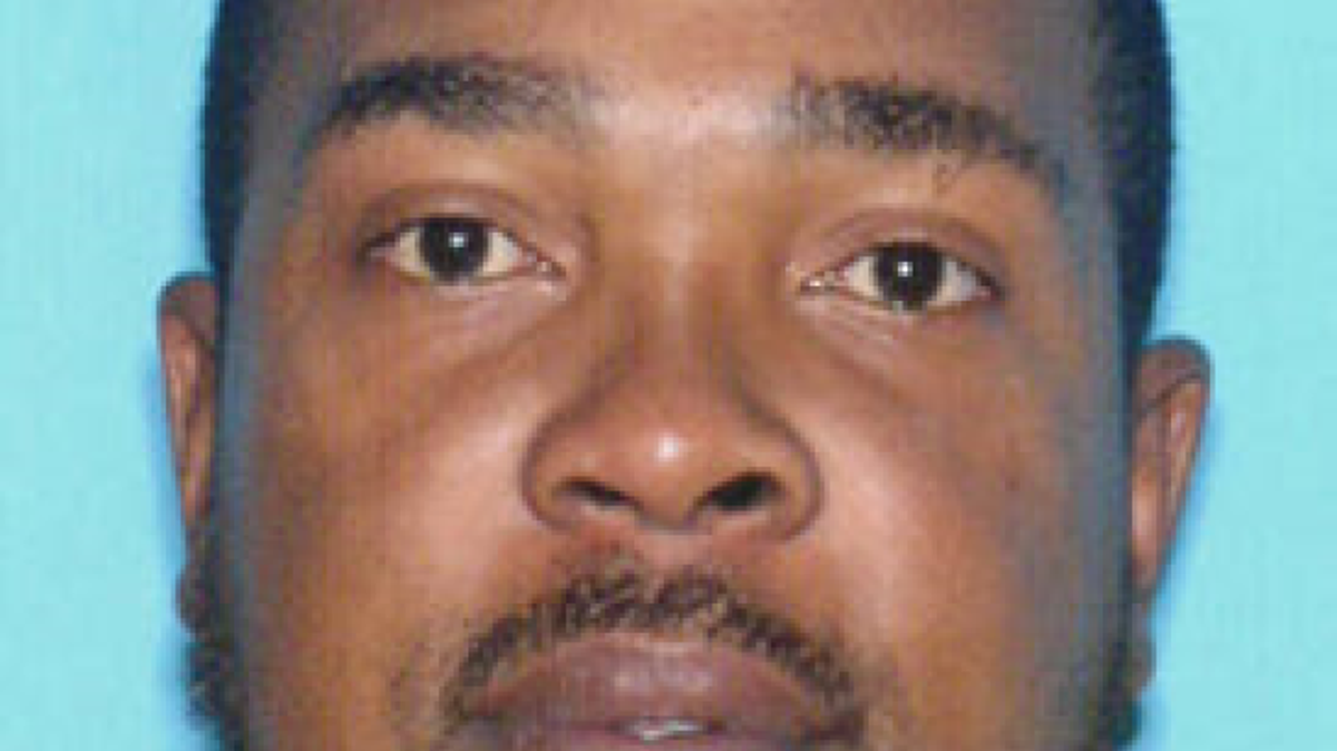Michael Descolline, wanted by the FBI for his alleged role in cocaine distribution, identity theft