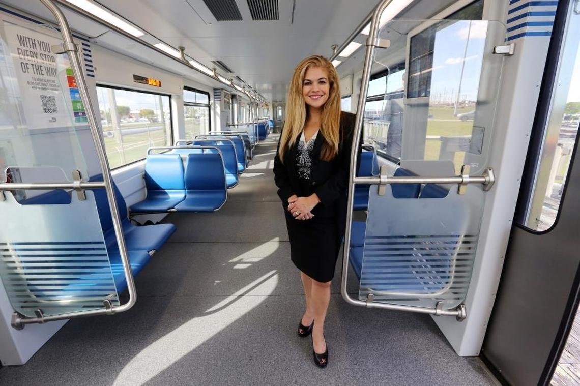 Alice Bravo, the director of transportation for Miami-Dade County, stands inside one of the first new Metrorail cars that are being tested and soon will be on the rails for commuters to ride. Some of the improvements on the new train cars are improved A/C, Wi-Fi, more comfortable (and graffiti-proof) seats, bicycle racks and security cameras.