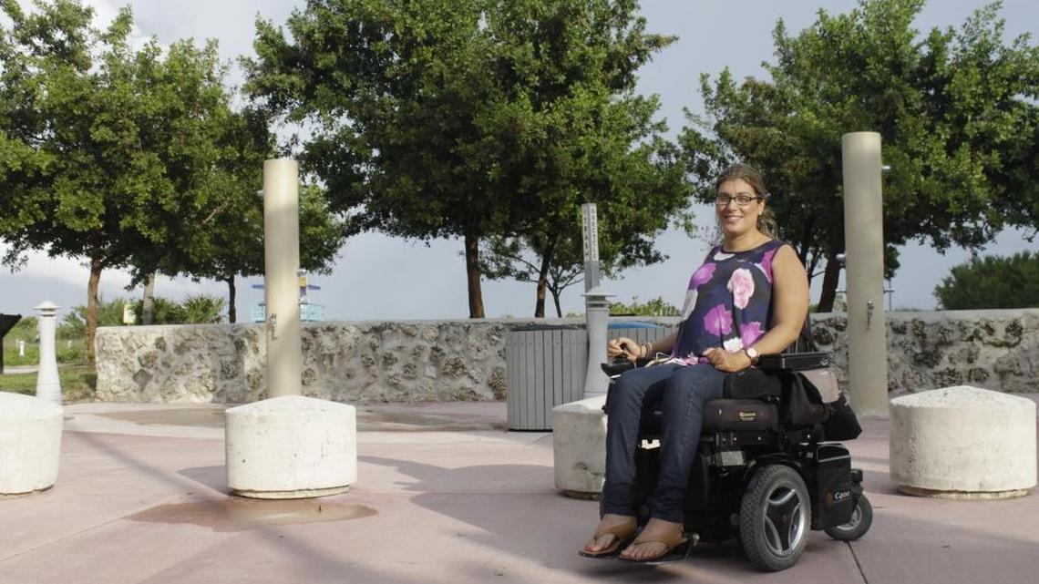 Sabrina Cohen, who was paralyzed after a car accident more than 20 years ago, heads a foundation that wants to build a three-story wellness center in an oceanfront park in Miami Beach. Neighbors have spoken out against the proposal.