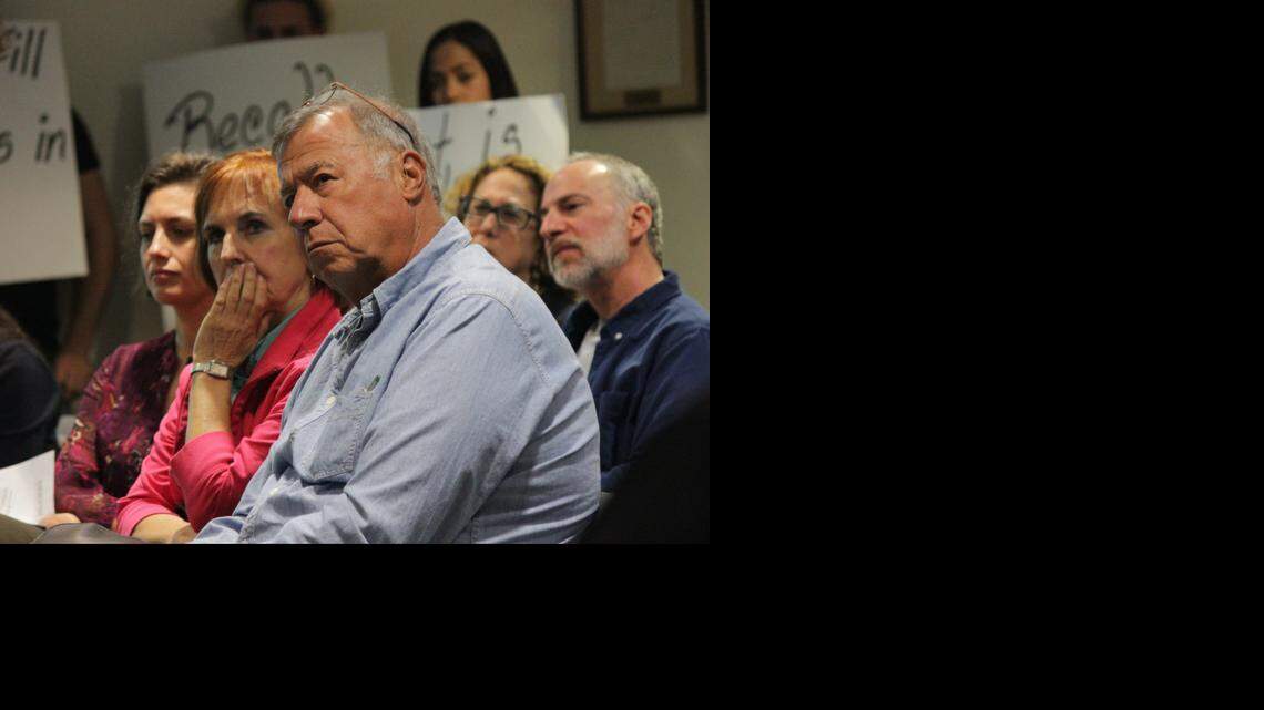 
Jeffrey Platt, resident of Surfside and chairman of the sand committee, center, came out to a commission meeting on Jan. 13, 2015. Platt is urging Surfside's government to help detoxify and renew the town's sand.
