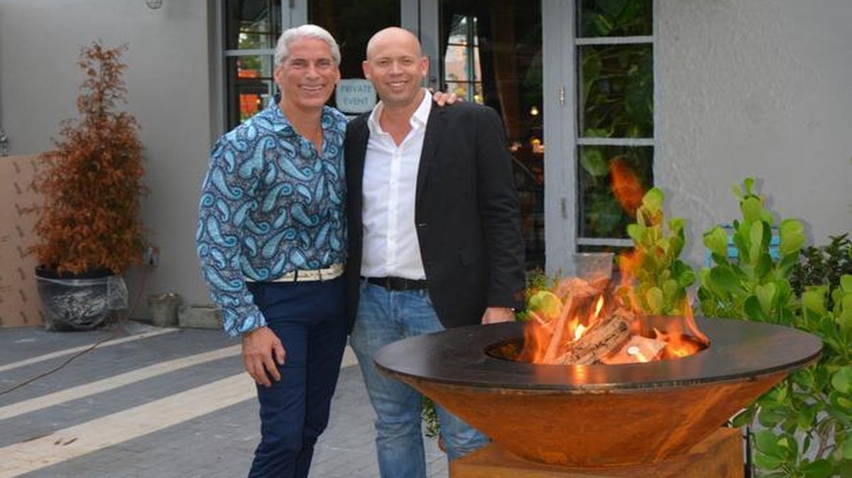 
Wynwood Diner operating partner Jerry Böck with Michiel Schuitemaker of Arteflame Grills on back patio during pre-opening event Aug 13.
