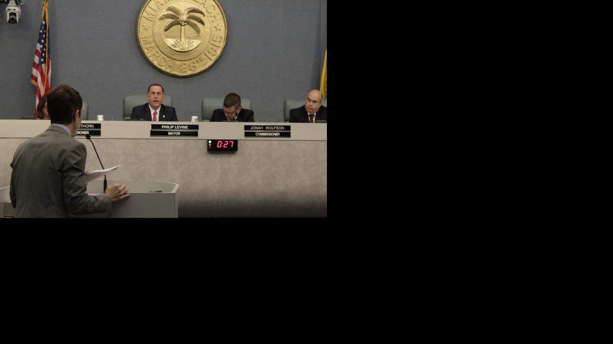 
Miami Beach Mayor Philip Levine, along with commissioners Jonah Wolfson and Ed Tobin, listen to resident Gerald Posner, who is with the South of Fifth Neighborhood Association, oppose the Flagstone project on Watson Island. The City Commission heard opposition from several residents at Wednesday’s meeting. The residents are concerned about traffic snarls on the MacArthur Causeway if the project comes to pass.
