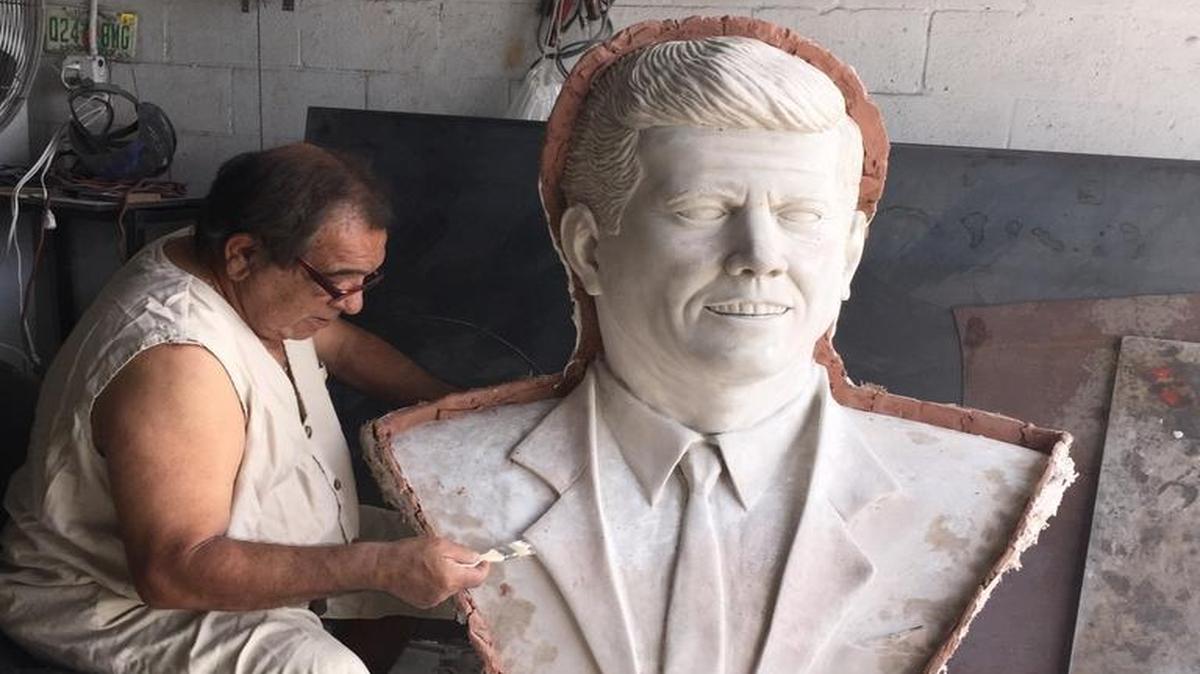 Sculptor Jose Ricardo Pinto is restoring the bust he made of John F. Kennedy. North Bay Village officials want to have a dedication ceremony early next year.