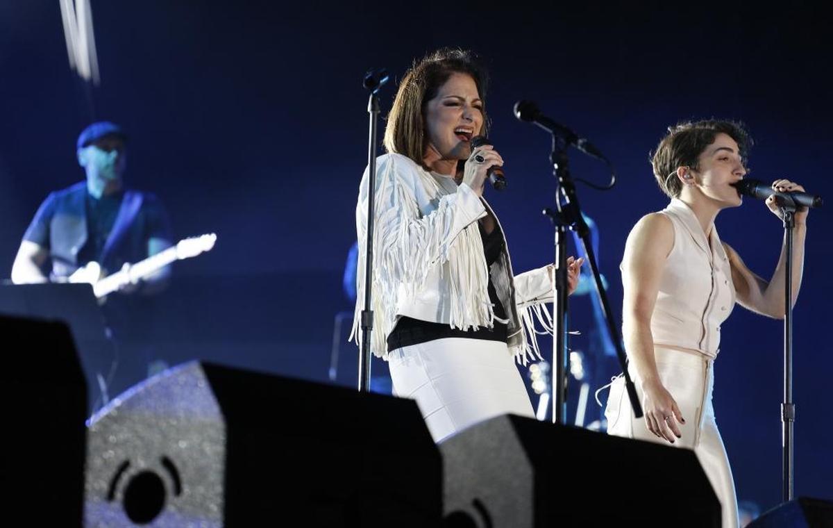 Gloria Estefan performs with daughter, Emily, right, on stage at the Hard Rock Rising Miami Beach concert celebrating the city’s centennial in 2015.